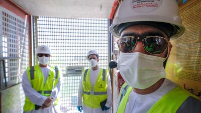 Abu Dhabi City Municipality inspectors at work. Victor Besa / The National