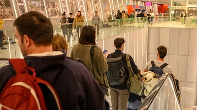 People seek cover in an underground station in Tel Aviv, Israel, after sirens were activated. Getty Images