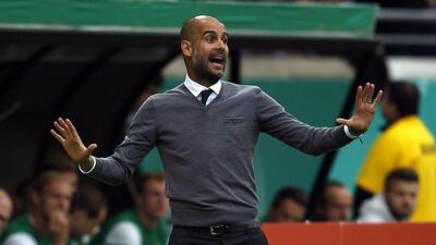 Bayern Munich manager Pep Guardiola reacts during a German Cup match against Preussen Munster on Sunday. Ina Fassbender / Reuters / August 17, 2014