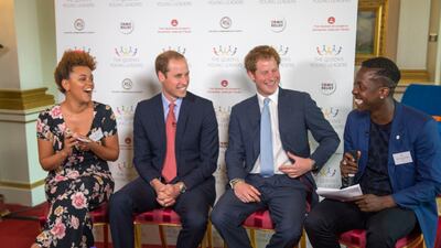 Gemma Cairney, Prince William, Prince Harry and Edwards at the launch of The Queen's Young Leaders Programme at Buckingham Palace in 2014. Getty Images