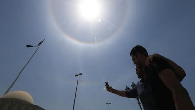 Drinking in the view: a halo forms a circle around the the sun and shines on Abu Dhabi. Ravindranath K / The National