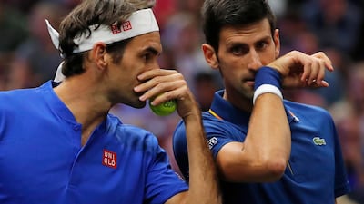 Roger Federer, left, and Novak Djokovic were defefeated in their doubles debut together but Team Europe produced a clean sweep in the singles. AP Photo