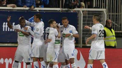 Auxerre's players celebrates after scoring in their Coupe de France semi-final win over Guingamp on Tuesday. Jean-Philippe Ksiazek / AFP / April 7, 2015