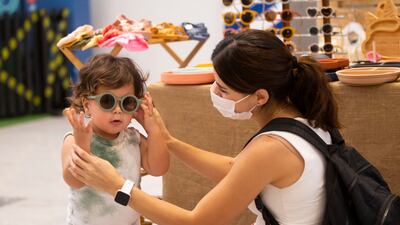 Shoppers young and old are checking out the goods.