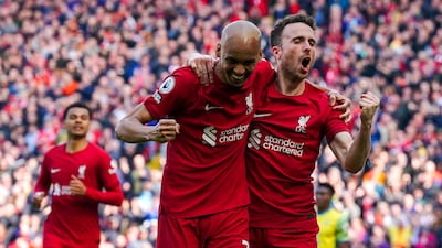 Liverpool's Diogo Jota (right) celebrates scoring the opening goal with Fabinho during the Premier League match at Anfield, Liverpool. Picture date: Saturday April 22, 2023.
