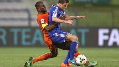 Al Nasr forward Brett Holman, right, in action during his team's draw with Ajman on March 7. Ashraf Al Amra / Al Ittihad