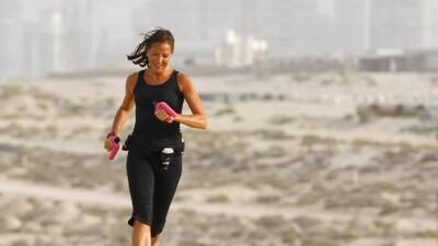 Victoria Leckie, who has signed a sponsorship deal with the sports giant Adidas, goes for a training run on the outskirts of Dubai.