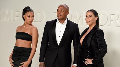 Truly Young, Dr Dre and Nicole Young attend the Tom Ford show during New York Fashion Week on February 7, 2020, in Los Angeles. AP