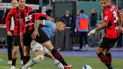 AC Milan's Sandro Tonali and Lazio's Mattia Zaccagni in action. EPA