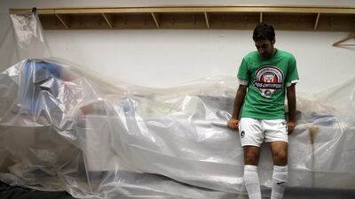 New York Cosmos' Raul sits in the locker room following his team's win over Ottawa Fury for the NASL Championship in Hempstead, New York, November 15, 2015. REUTERS/Brendan McDermid