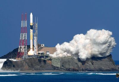 Japan's rocket H-2A launches, carrying KhalifaSat, a UAE satellite, on board. Kyodo News