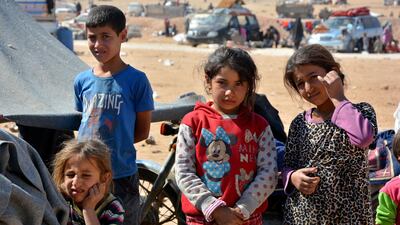 Displaced Syrian children who fled from Deir Ezzor and Raqqa cities seen in the Qana refugee camp in southern Hassakeh province on October 11, 2017. Youssef Rabih Youssef / EPA