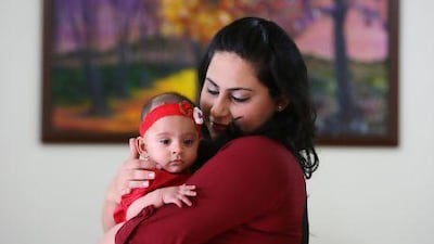 Samaiya Sakrani with her daughter, 6-month-old Rania, at her villa in Mirdif in Dubai. Pawan Singh/The National