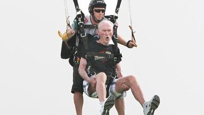 Dick Corbit, 86, prepares to land after jumping out of a plane 4000m above Dubai to celebrate his birthday.