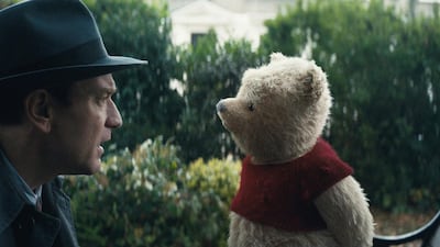 Ewan McGregor plays Christopher Robin opposite his longtime friend Winnie the Pooh in Disney’s heartwarming live action adventure Christopher Robin. Courtesy Of Disney