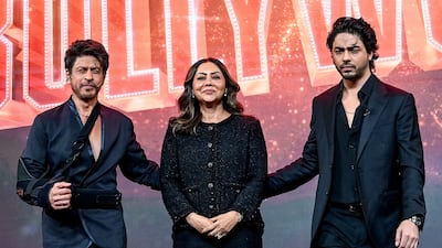 Bollywood actor Shah Rukh Khan, left, with his wife Gauri Khan and his son Aryan Khan at the preview Netflix series The Ba***ds of Bollywood. AFP