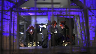 Israeli emergency workers in Arad. EPA