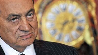 Swiss banks are beginning to disclose assets of Hosni Mubarak. AFP PHOTO / ATTILA KISBENEDEK