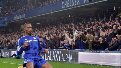 Chelsea's Didier Drogba celebrates his goal in his side's victory over Tottenham Hotspur in the Premier League on Wednesday. Glyn Kirk / AFP