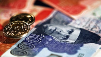 Protracted negotiations over loans with the IMF are among the factors weighing down Pakistan's economic outlook. Bloomberg