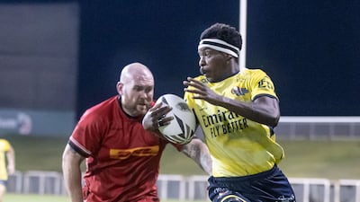 Dubai Hurricanes' Martin Mangwiro, right, during the West Asia Super Rugby final against Bahrain at The Sevens in Dubai. Ruel Pableo for The National