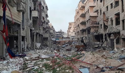 Buildings damaged from fighting and Syrian government air strikes in Harasta, Eastern Ghouta, near Damascus, Syria. Danny Makki / AP