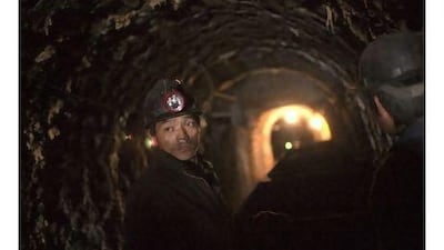 While coal mines are famously dark, China's skies are becoming relatively brighter as the country's coal-burning power plants add more pollution-control equipment, a reader says. Nelson Ching / Bloomberg