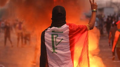 An Iraqi protester gestures in Tayaran Square in Baghdad. AFP