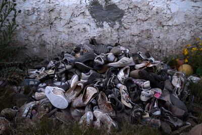 The shoes of migrants were retrieved by artist Mohsen Lahzib to create art from the continuing tragedy. AP