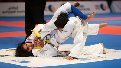 Latifa Ali Al Shamsi of UAE fights compatriot Boshra Ghanem Al Zadjali in their 38.5kg match at the Junior World Jiu-Jitsu Championship. Christopher Pike / The National