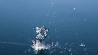 The IRGC conducts a military drill in the Strait of Hormuz, which is a key route for world crude oil market. EPA