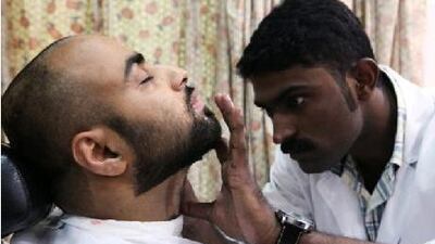 Happy and Ruby Group Saloon across from Al Wahda Mall provides hair cut and shaving services to their mostly Arab customers.