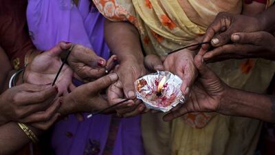 Bathing in sacred waters on the most auspicious day of the Kumbh festival, or Pitcher Festival, believers say rids them of their sins.