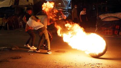 Palestinian protesters clash with Israeli troops at in the city center of the West Bank city of Hebron. Clashes erupted in Hebron during a demonstration in support of Palestinians in Jerusalem after Israeli police restricted access and gathering in areas around Damascus Gate of the Old City of Jerusalem, which led to nightly clashes between Palestinians and Israeli police. EPA