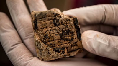 An ancient artefact illegally smuggled to retailer Hobby Lobby Stores is shown during an event to return several thousand similar ancient pieces to Iraq. US Immigration and Customs Enforcement/Handout via REUTERS