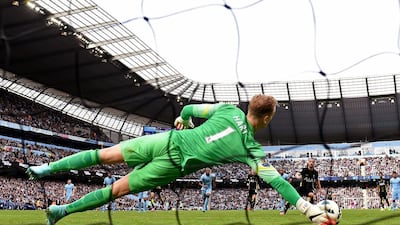 Goalkeeper Joe Hart of Manchester City saves a penalty attempt from Roberto Soldado of Tottenham Hotspur during their Premier League match at the Etihad Stadium on Saturday. Michael Regan / Getty Images