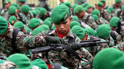 Indonesian soldiers train in Jakarta before potential overseas assignments, including peacekeeping missions. EPA
