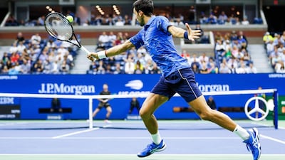 Novak Djokovic returns a shot. EPA