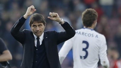 Chelsea manager Antonio Conte celebrates towards his teams fans after the end of the English Premier League match against Bournemouth at the Vitality Stadium in Bournemouth, England, Saturday, April 8, 2017. Chelsea won the game 3-1. Matt Dunham / AP Photo