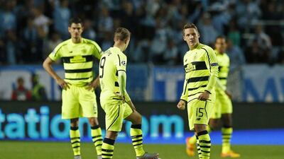 Celtic's Leigh Griffiths and Kris Commons react after an own goal on Tuesday night in their 2-0 second-leg loss to exit the Champions League 4-3 on aggregate to Malmo. Andrew Boyers / Action Images / Reuters