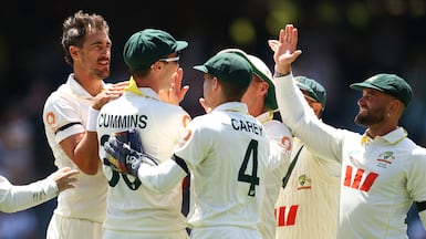 Australia's players celebrate after taking the wicket of England's Jamie Smith in Adelaide. Getty Images