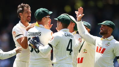 Australia's players celebrate after taking the wicket of England's Jamie Smith in Adelaide. Getty Images