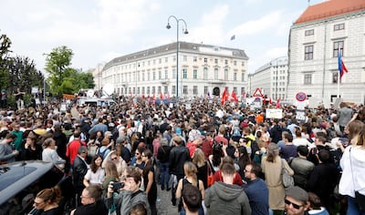 People gather outside the office of Austria's Vice Chancellor Heinz-Christian Strache in Vienna, Austria, 18 May 2019. EPA