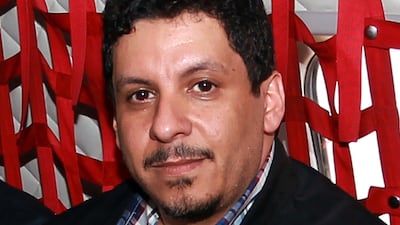 A picture taken on September 19, 2014 shows Yemeni politician Ahmed Awad bin Mubarak as he rides on a plane returning from the Shiite rebel stronghold of Saada to the capital Sanaa. Gunmen on January 17 seized Mr Mubarak, who currently serves as Yemeni president Abdrabuh Mansur Hadi's chief of staff AFP Photo