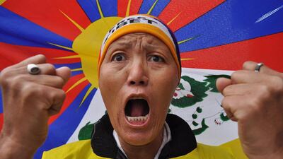 A supporter of Tibetans living in exile and of Tibetan Youth Congress (TYC) workers shouts pro-Tibetan slogans on February 10, 2014, during a peace march near Dharamshala, Himachal Pradesh, India, The TYC held a Tibetan Uprising March from Dharamsala to Delhi to raise awareness of China’s occupation of Tibet and the hard-line policies that “stifling and destroying Tibetan culture, language, identity and spiritual traditions.” Sanjay Baid / EPA