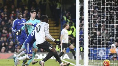 Chelsea keeper Thibaut Courtois watches as John Terry turns in an own goal next to Everton’s Romelu Lukaku for the opener on Saturday. Justin Tallis / AFP