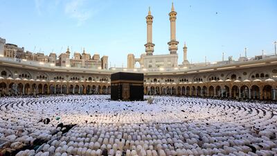 Muslims perform morning prayer around the Kaaba at the Grand Mosque in Saudi Arabia's holy city of Makkah at the start of Eid Al Fitr. AFP