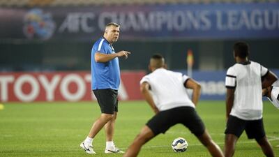 Cosmin Olaroiu, left, preparing his Al Ahli side for the Asian Champions League. AFP