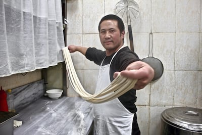 Eisa Ma, 28, a master of making laghman noodles from scratch. Miriam Berger