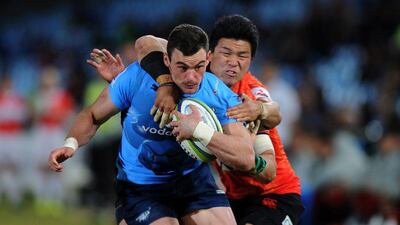 Jesse Kriel of Blue Bulls is tackled during his team's Super Rugby win over Japan Sunwolves on Saturday. Stringer / AFP / July 9, 2016